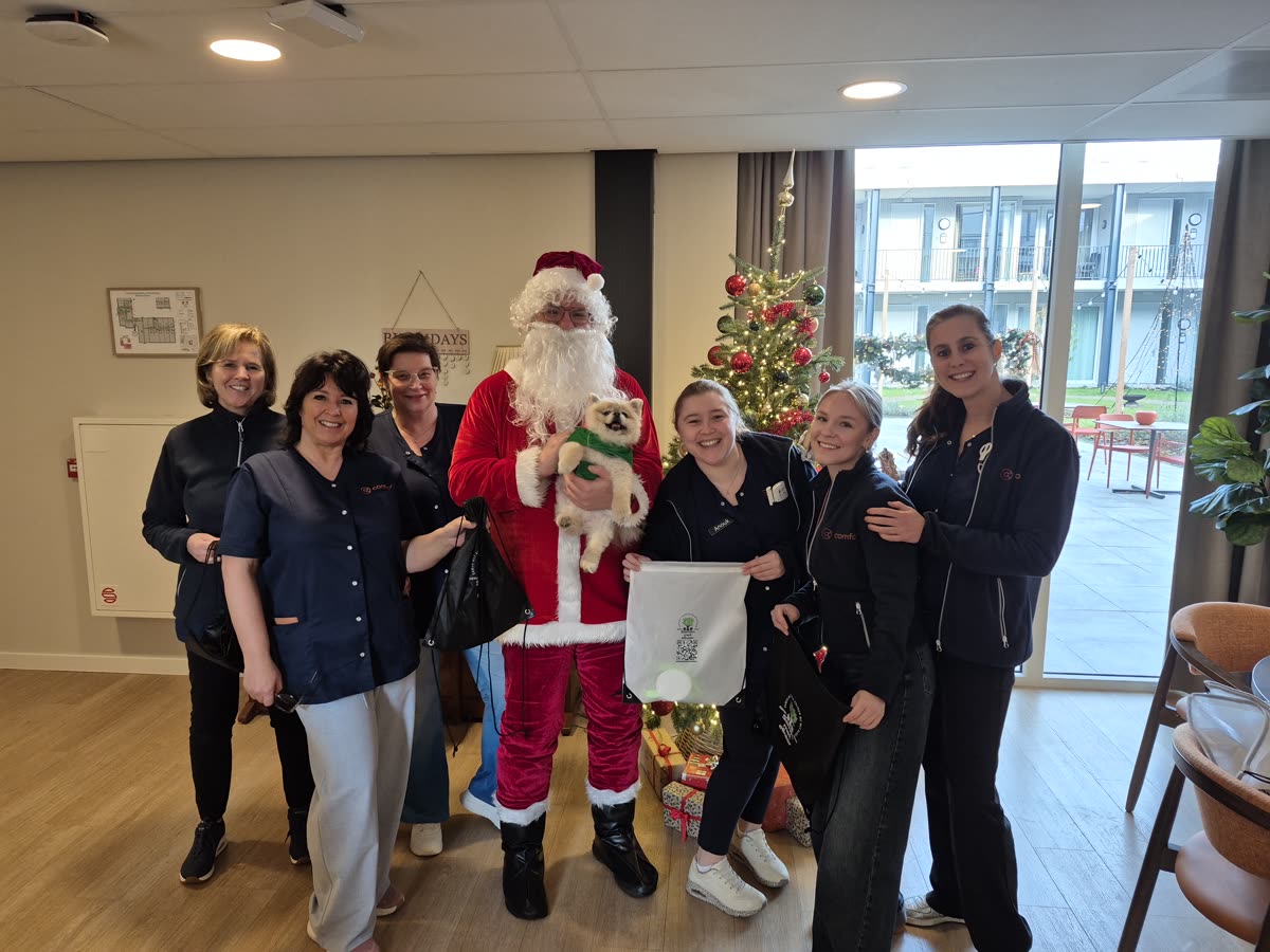 Groepsfoto met de medewerkers
